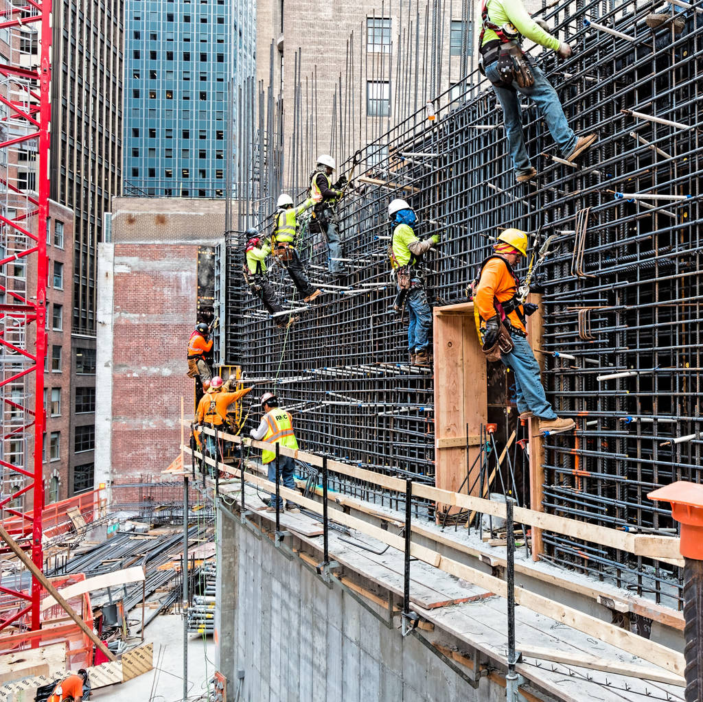 construction workers tying superstructure rebar